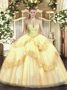 Gold Ball Gowns Tulle Halter Top Sleeveless Appliques and Sequins Floor Length Lace Up Quinceanera Dresses