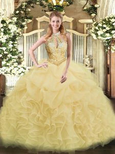 Classical Halter Top Sleeveless 15 Quinceanera Dress Floor Length Beading and Ruffles Champagne Organza