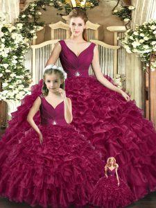 Burgundy Ball Gowns Organza V-neck Sleeveless Beading and Ruffles Floor Length Backless Quinceanera Gowns