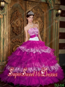 Sweet 16 In Fuchsia Ball Gown Strapless With Organza and Zebra Ruffles Ball Gowns